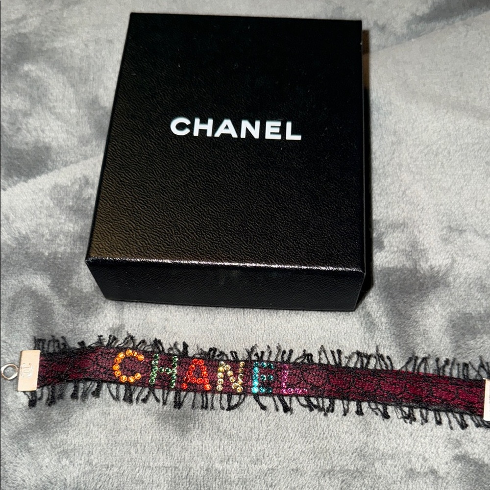 Preloved Chanel bracelet with colorful rhinestones it’s in good condition Sz 7”